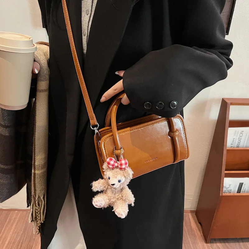 

Niche design portable small bag women's 2025 spring new fashion retro small square bag versatile messenger bag