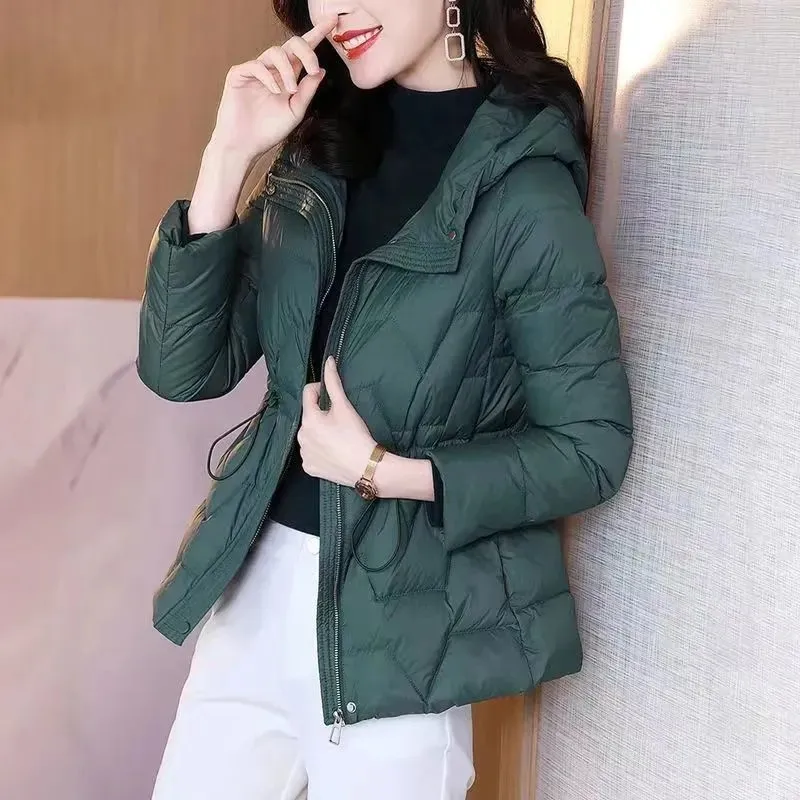 Abrigo corto de algodón para mujer, Parka holgada con capucha, chaqueta gruesa de lana, color puro, a la moda, novedad de invierno, 2024