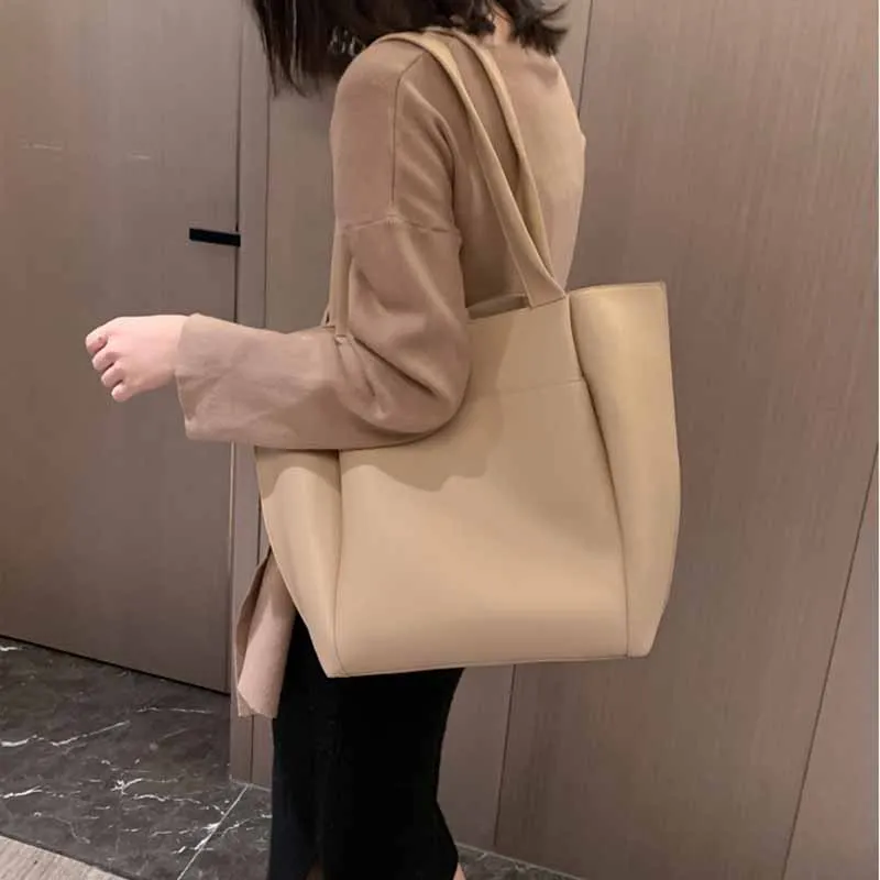 

2025 Новые модные повседневные женские сумки из мягкого искусственной кожи, однотонные женские сумки на плечо большой вместимости, ретро-сумка для поездок на работу по магазинам и работе