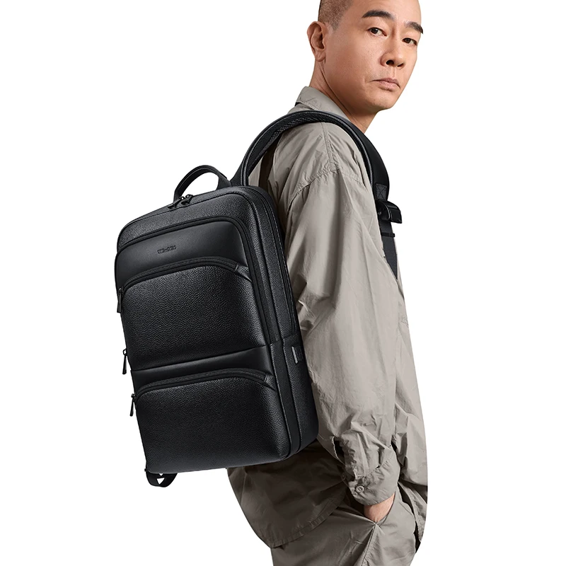 

Leather men's backpack multifunctional laptop bag large capacity casual backpack