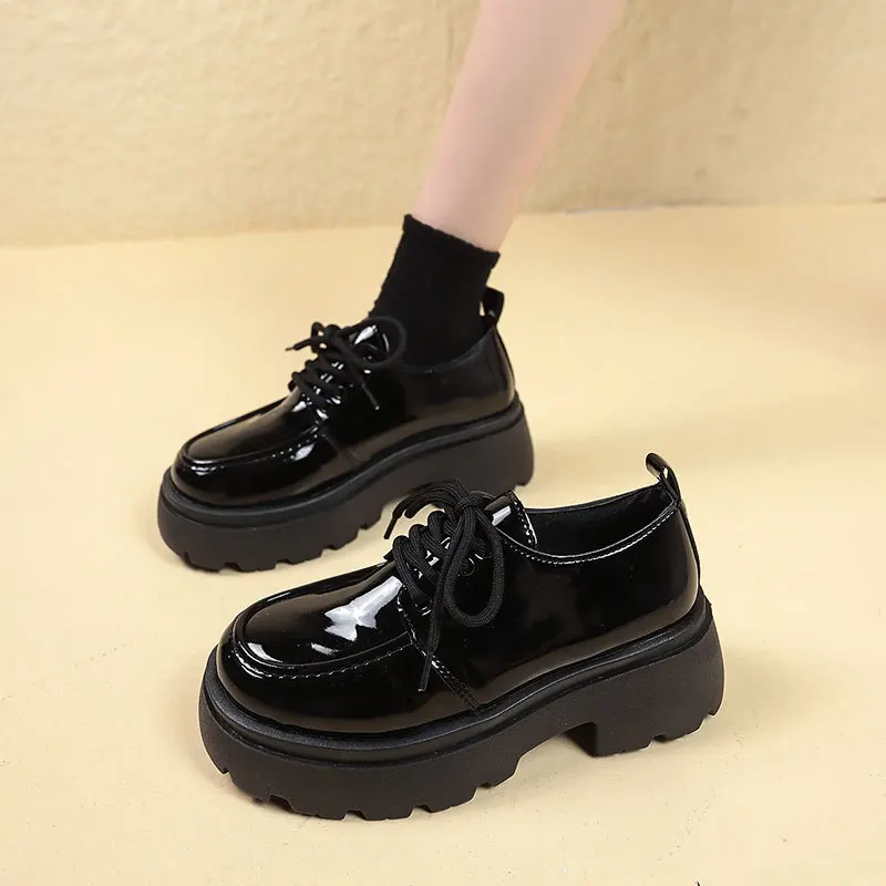 2024 autumn and winter small leather shoes women's new style patent leather round toe height increasing single shoe looks good