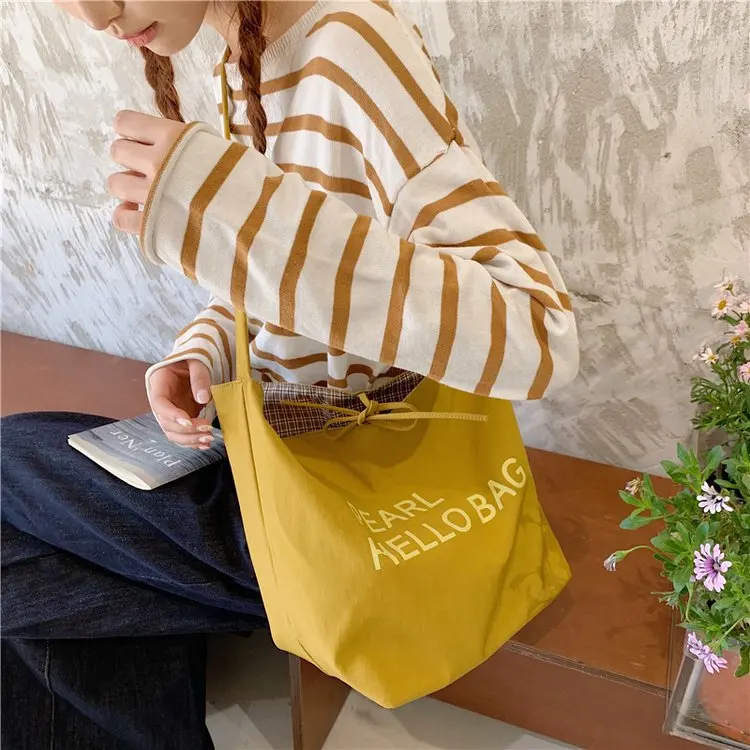 

2025 Autumn New 2341 Nylon Cloth Medium Canvas Fashion Versatile Strap Tote Bag Printing Fashion Popular Shoulder Bag
