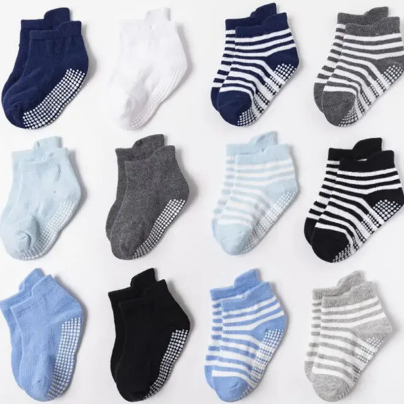 6 pairs of anti slip socks for boys, adhesive point socks, and short socks with anti drop heel design at the back. Boys' walking