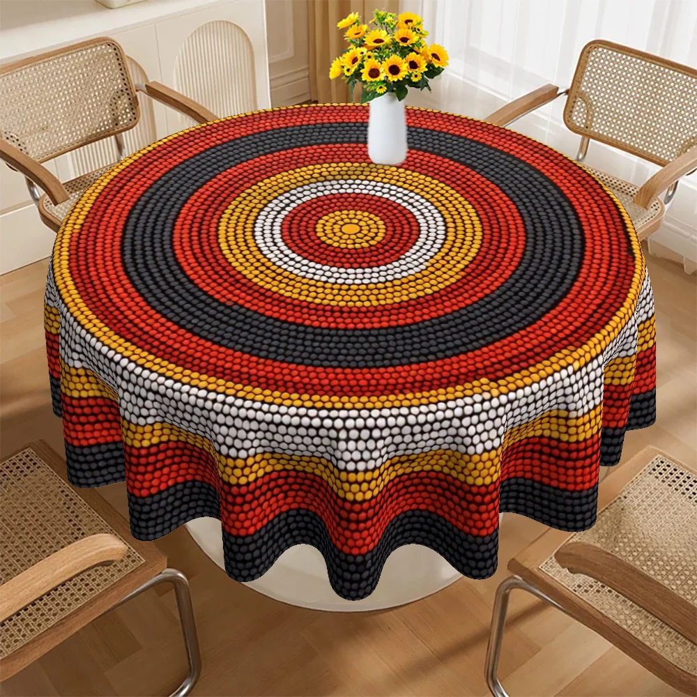 Indigenous-style tablecloth, decorated with black, red, yellow and white circular patterns