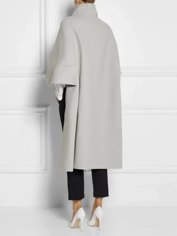 UOOZEE Women's Elegant Turtleneck Cape Style High-Low Jackets Loose Solid Color Buckle Detail Fashion Casual Office Outerwear