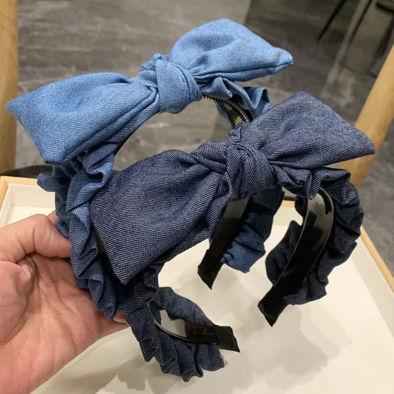 Copricapo da donna popolare Fasce per capelli dentate in tessuto denim arricciato Fasce per capelli annodate con fiocco superiore per le donne Indossa la testa per lo shopping casual