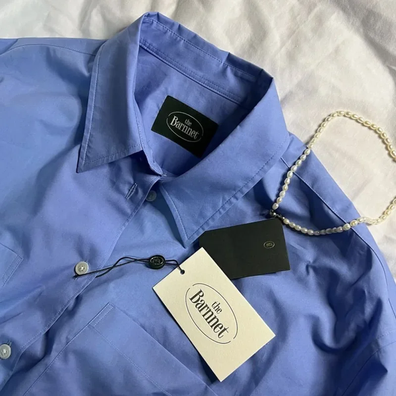 

Spring new blue shirt Korean version of simple and versatile stacked wear long-sleeved embroidered shirt women's top