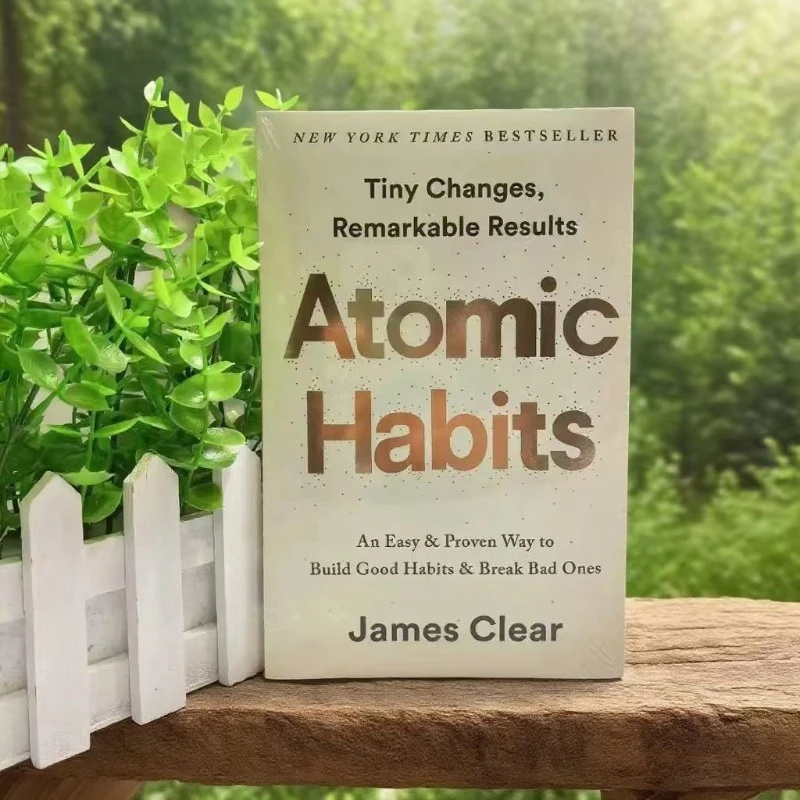 

Книга «Атомные привычки английского издания» — «Крихітные изменения» Система замечательных результатов, набор инструментов для повышения производительности, идея подарка