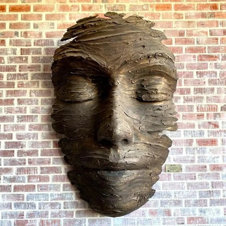 Outdoor abstract metal bronze face statue