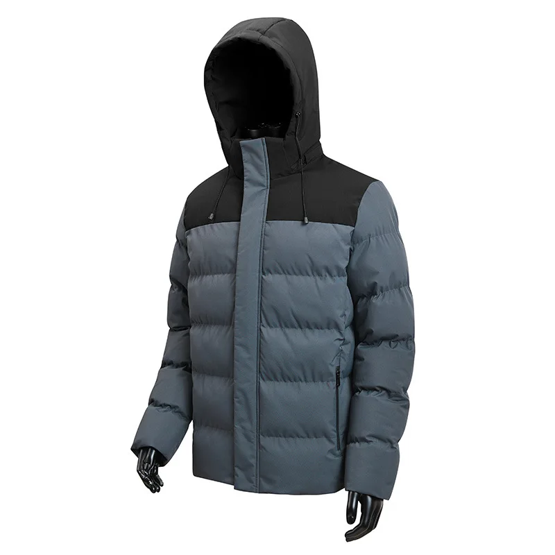 La nueva chaqueta acolchada de algodón con capucha y bloques de color de invierno para hombre es informal y versátil, gruesa, cálida y elegante.