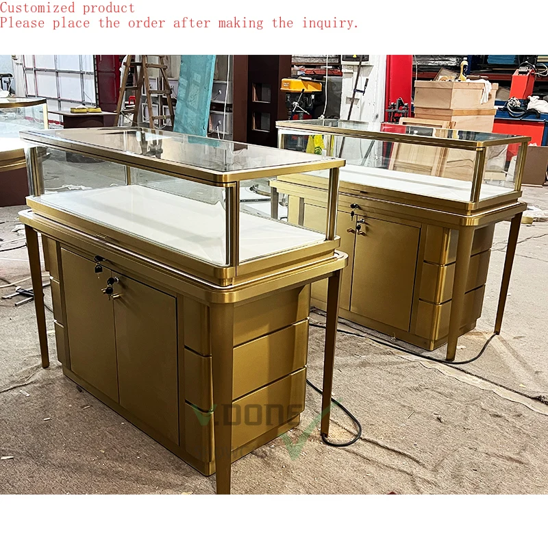 

Custom.Modern Jewelry Shop Golden Stainless Steel Jewellery Counter Display Cabinet Jewelry Store Decoration Furniture Customize