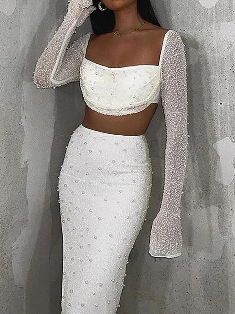 

Повседневный пляжный костюм с жемчугом и длинными рукавами, весенне-летние каникулы, однотонная одежда, женский сексуальный комплект из укороченного топа и юбки с квадратным вырезом