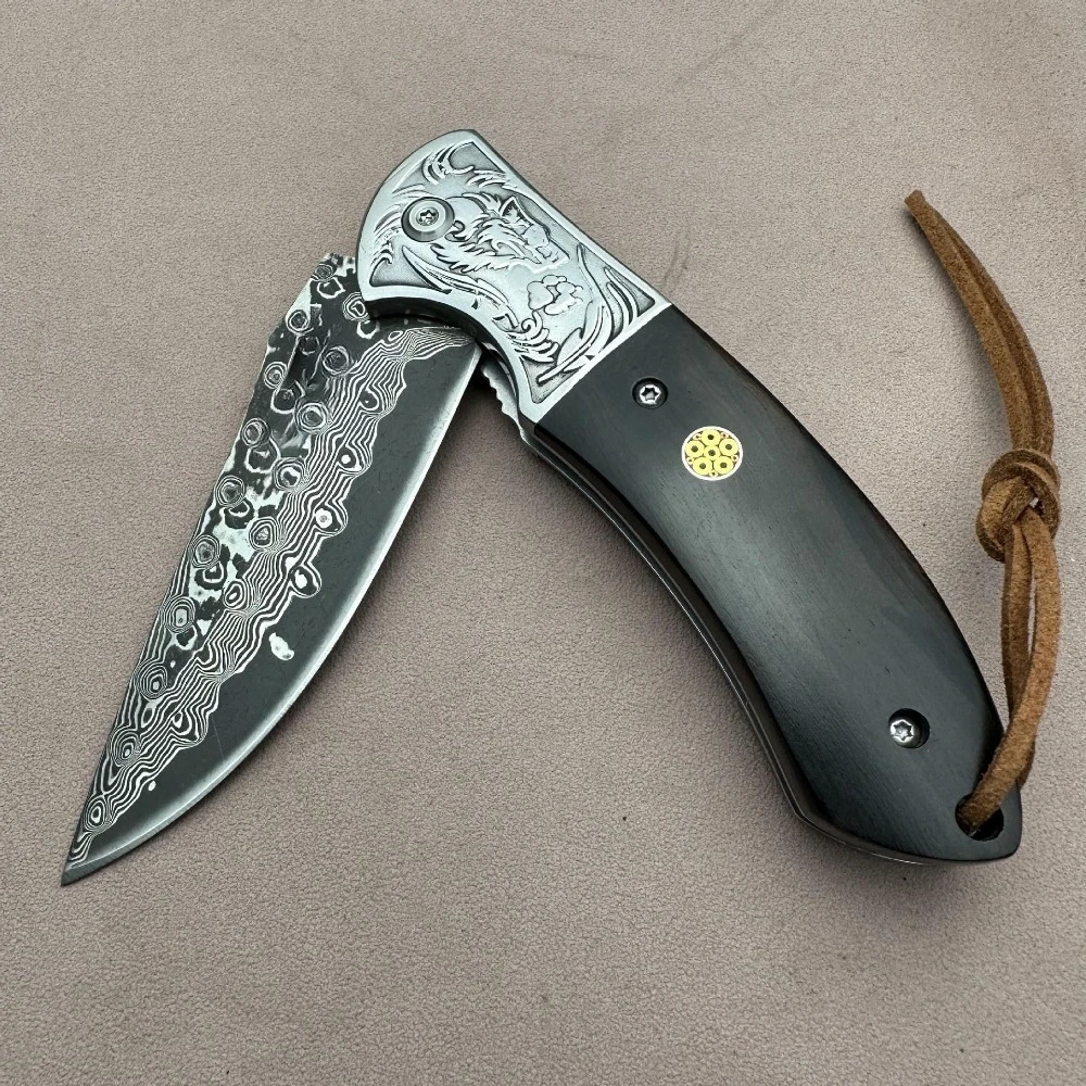 Coltello pieghevole testa di lupo Lama di Damasco conchiglia manico in ebano coltello da tasca EDC da campeggio all'aperto vendita calda transfrontaliera
