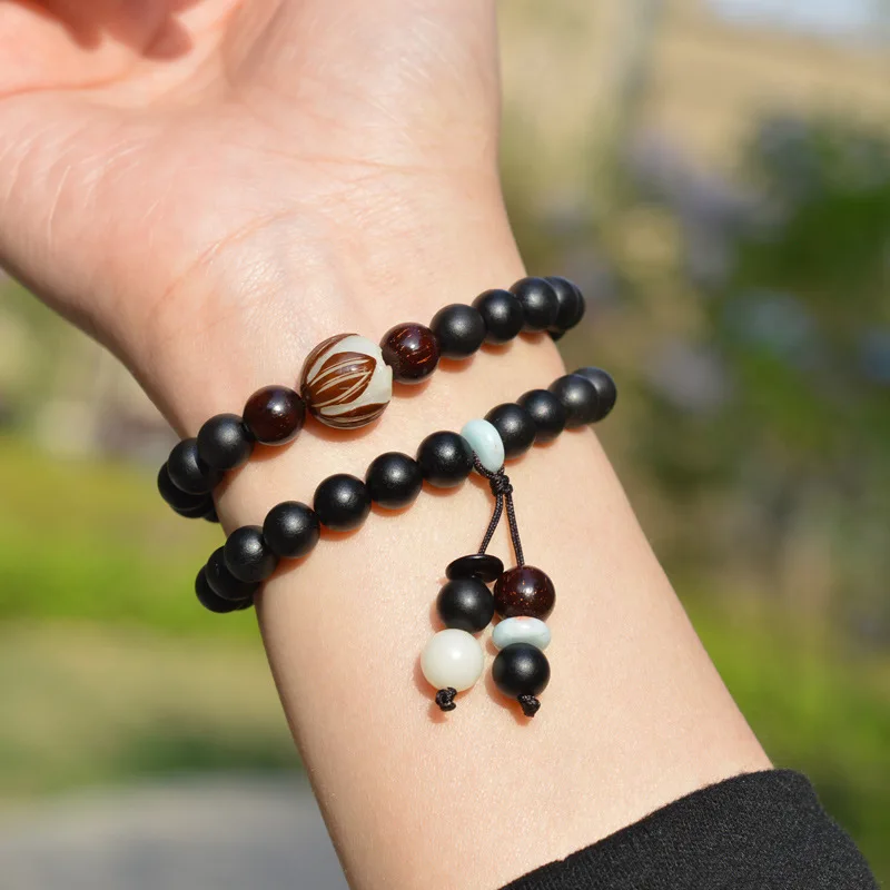 Tibetan-style original black ox horn Buddhist bead , small-leaf rosewood bracelet, Chinese medicine for health maintenan