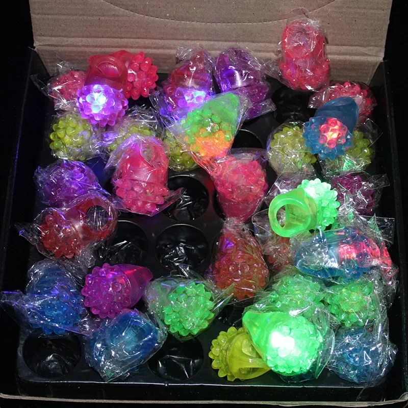 [Funny] 50pcs/lot Flashing LED Light Up Toys Bumpy jelly Rings toy luminous Strawberry model ring girl evening of adornment gift