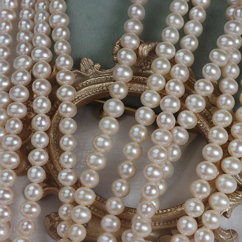 Champagne-colored 8.5-9mm egg-shaped round seedless natural freshwater genuine pearls, loose beads for DIY jewelry making.