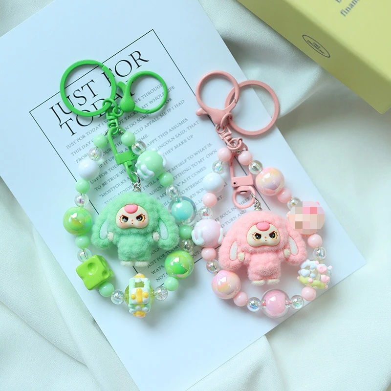 

Baby three new cute cartoon keychain flocking doll beaded pendant girl heart cartoon bag chain charm backpack decoration gifts
