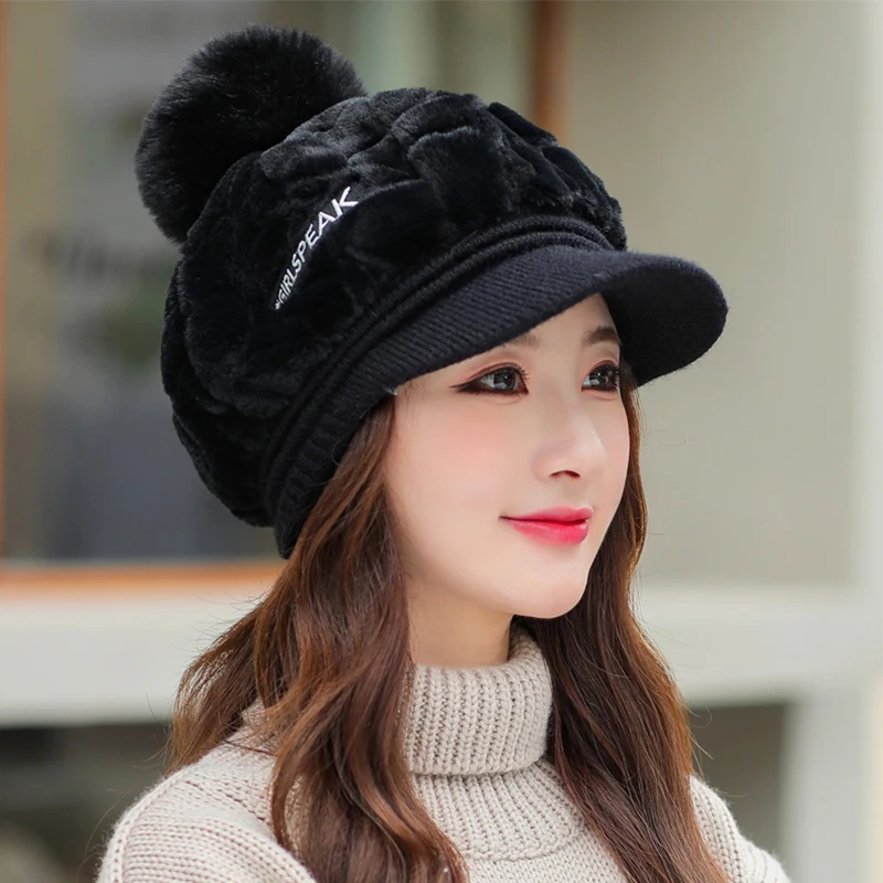 Autumn and winter new women\'s hats fashion wild plush warm duck tongue hat cute hairball cold protective ear cap