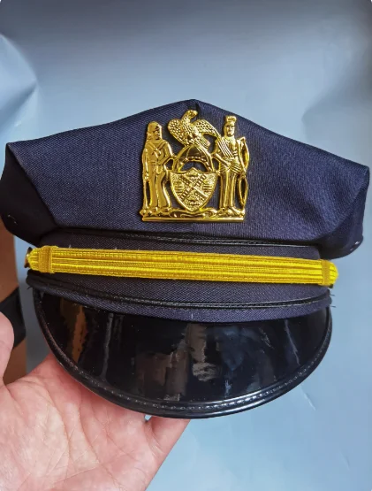 

New York Octagonal Hat with Golden Emblem