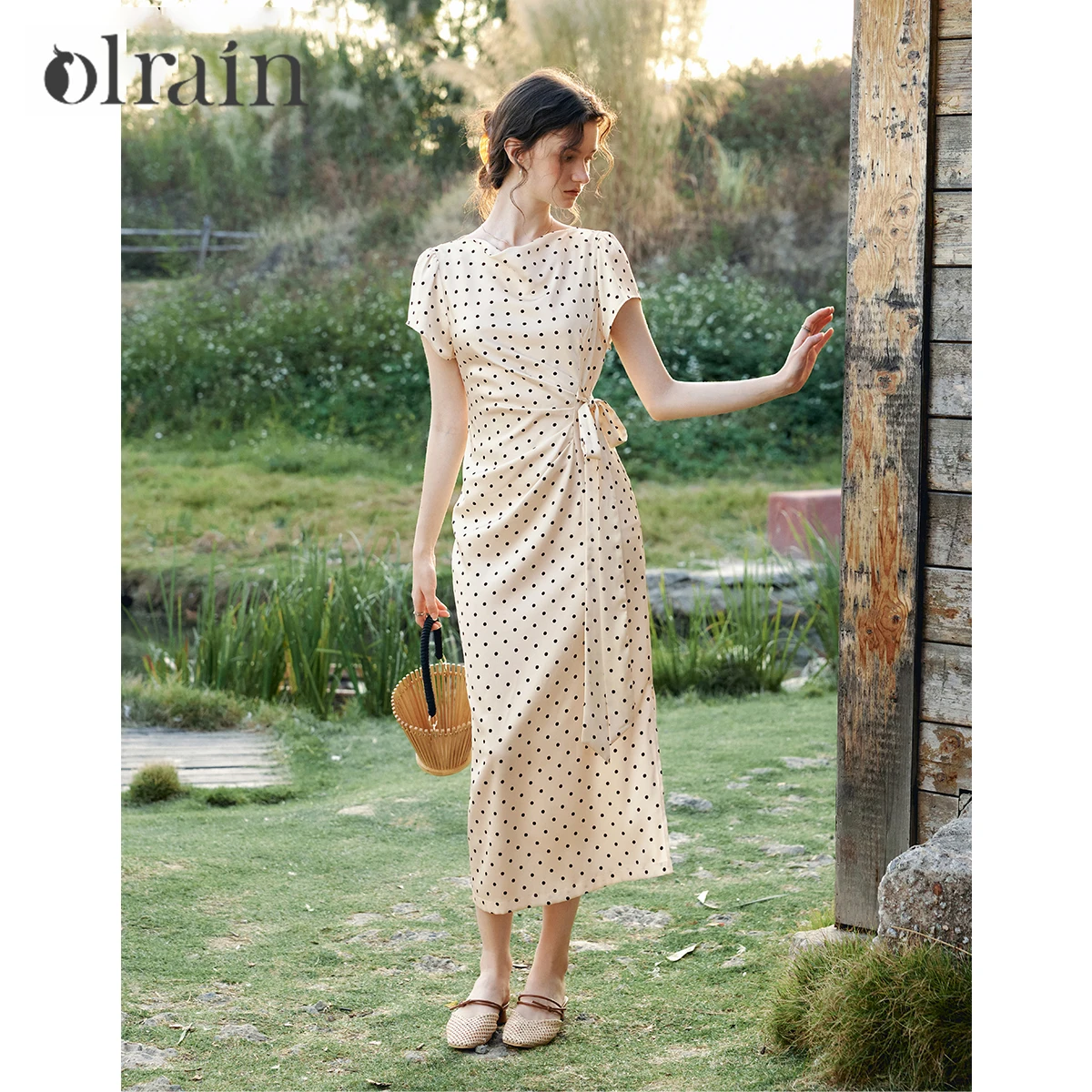 

OLrain Women Cream Polka Dot Dress 2026 Summer New Cowl Neck Side Twist Tie A-Line French Retro Slim Tea Party Dress O58XL002968