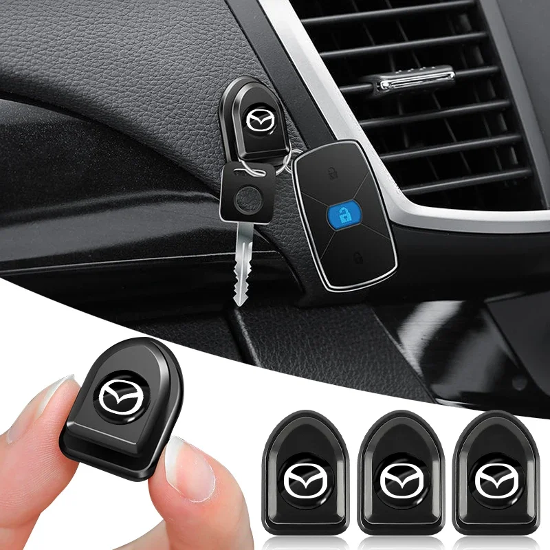

Mini Car Hooks: Self-adhesive hidden hooks, compatible with Mazda 2, 3, 5, 6, CX-3, CX-4, CX-5, CX-8, CX-7, and CX-9