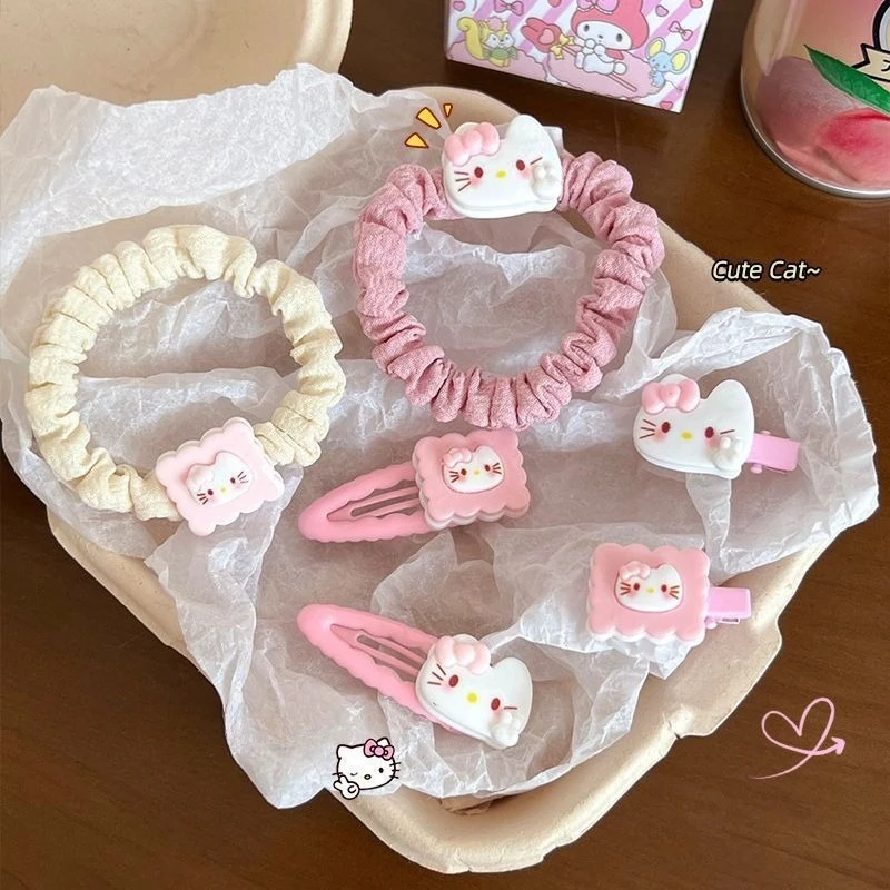 新しい可愛いハローキティ12点セット ピンクヘアピン 前髪 サイドヘアクリップ ヘッドバンド 女の子へのプレゼント