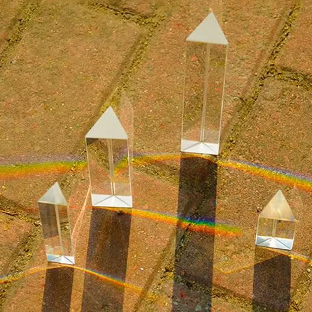 

Crystal Glass Triangular Prism Rainbow Color Spectrum Teach Tool Optical Refracted Rainbow Maker Photography Props Gift
