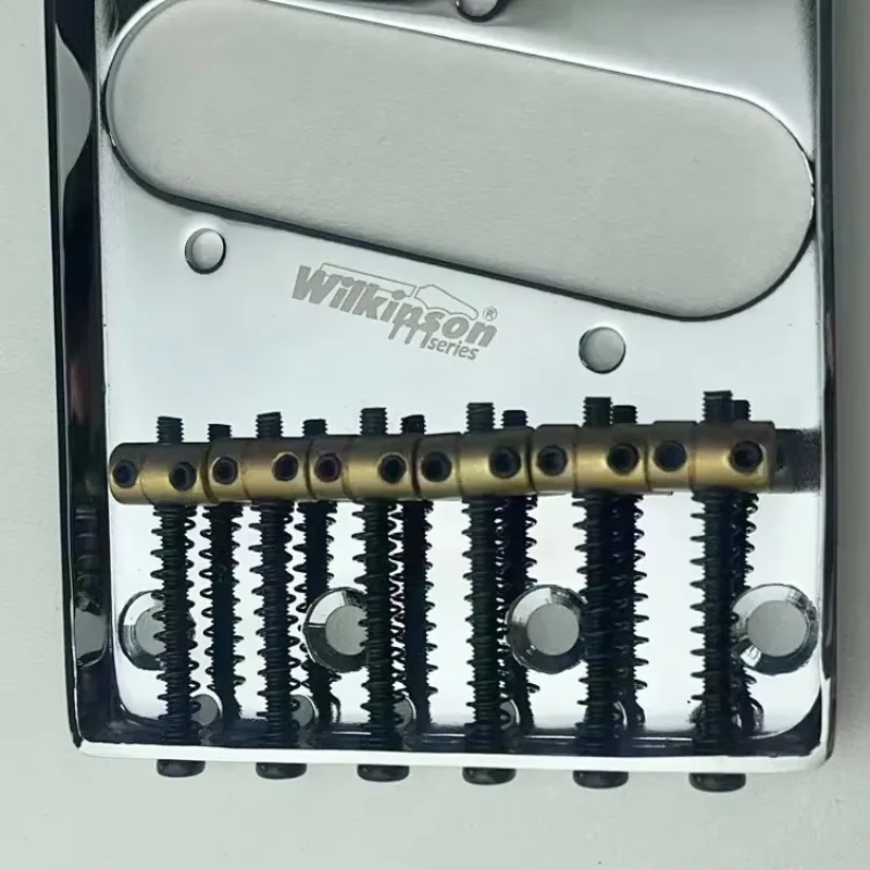 

Магазин Beyond Music Shop — серебристый винтажный бридж Wilkinson WOT02 для электрогитары, латунный бридж/гитарный мост, хром, серебро