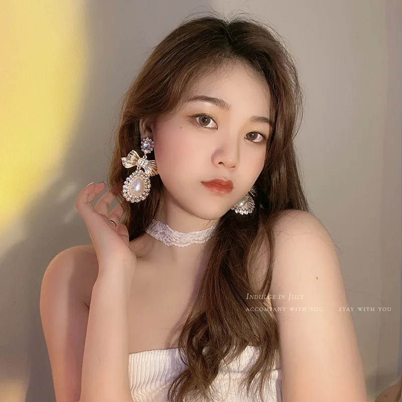 1 Pair European and American Style Exaggerated Design Bow-shaped Drop Earrings with Pearl and Diamond Inlays