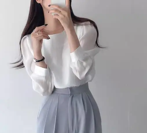 2026 Early Spring Fashion Simple Round Neck Mesh Slightly Transparent One Button Hollow Out Long Sleeved Bottom Shirt Top Women