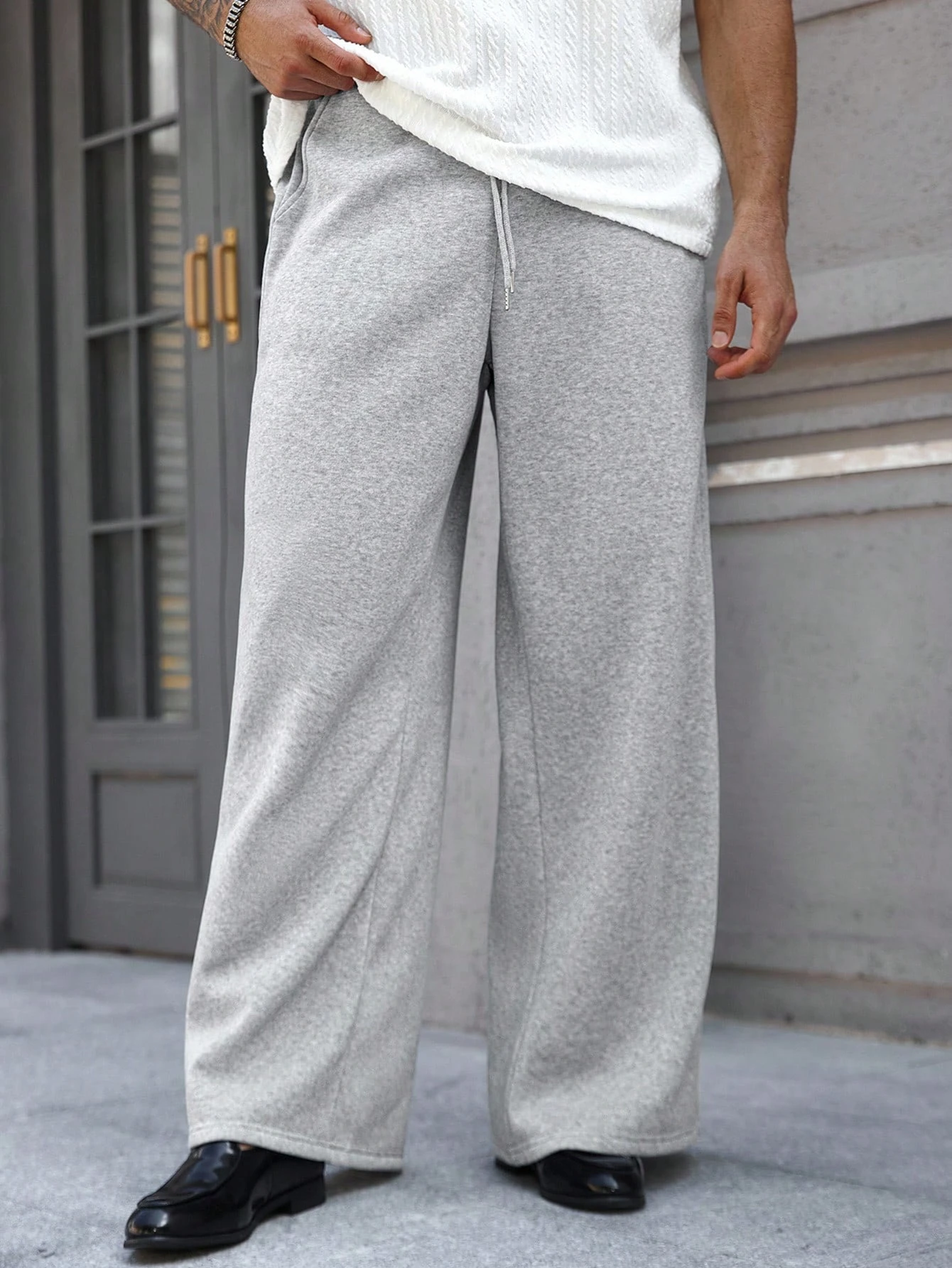 

Plus Size Men's Solid Color Drawstring Waist Pockets Wide Leg Loose Casual Sports Pants Autumn and Winter Sweatpants