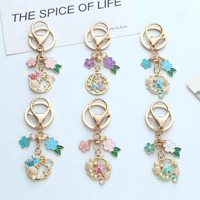 Fashion Coral Starfish Shell Pearl Flower Keychian for Women Ocean Style Drop Glaze Gold Color Key Chain Bag Decoration Jewelry