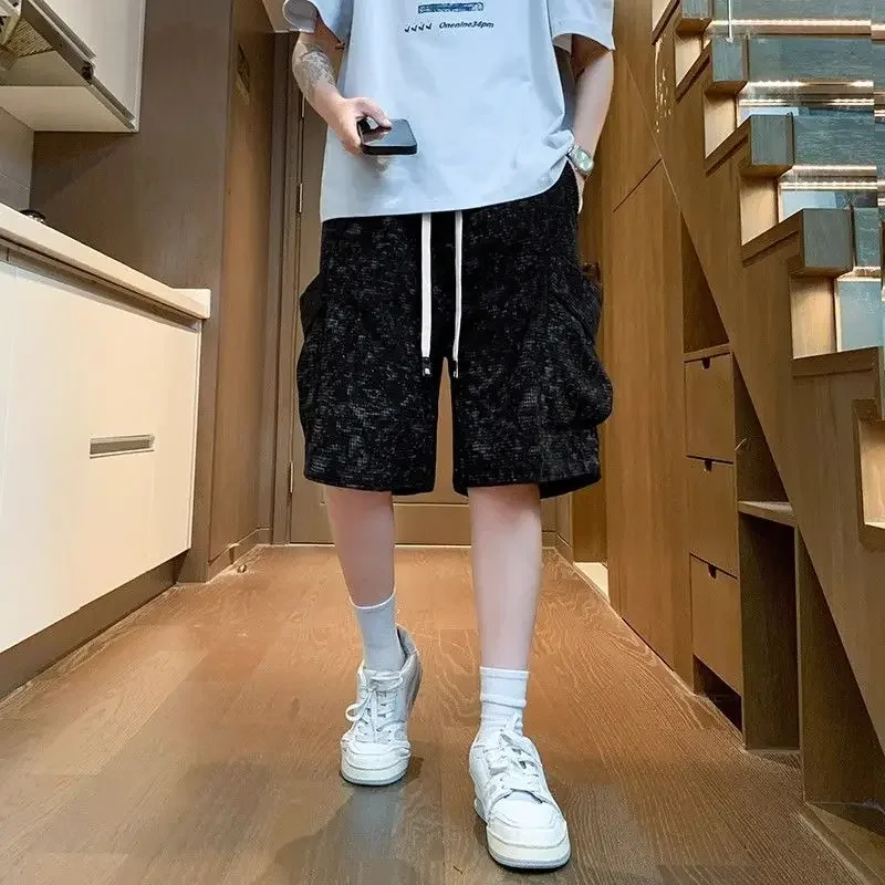 Pantalones cortos de gran tamaño para hombre, pantalones cortos largos holgados de talla grande para hombre, pantalones cortos Cargo con múltiples bolsillos, cintura media elástica, Bermudas negras holgadas nuevas