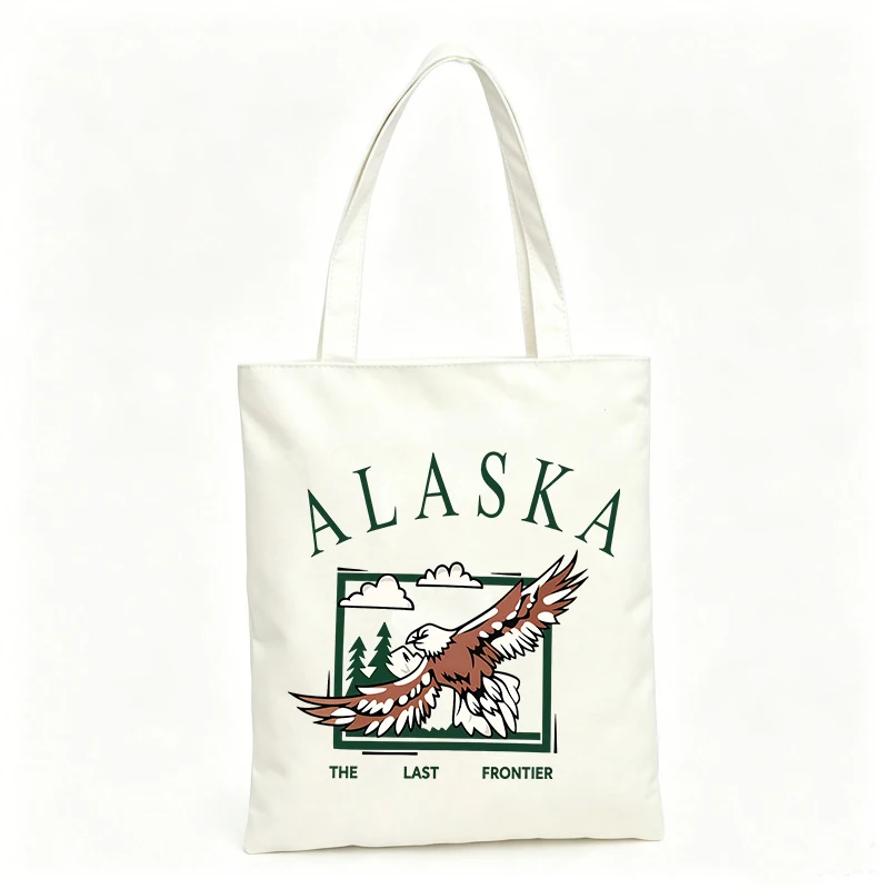 Women's eagle graphic canvas tote bag, vintage nature design for casual shopping and daily use