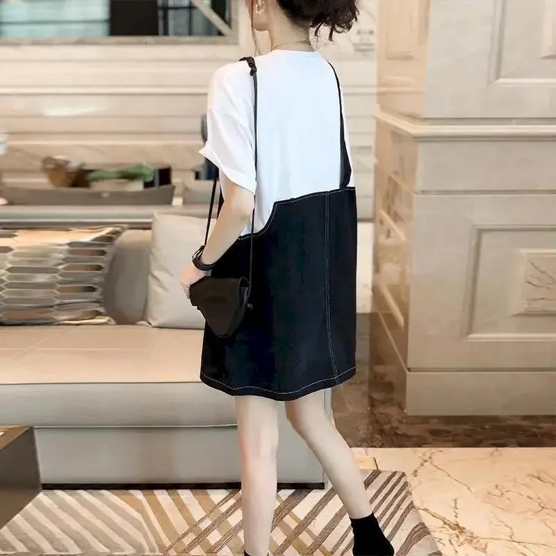 Zwarte denim bandjurk dames Franse casual nep tweedelige T-shirtjurk modeontwerp losse zomertrend dunne oversized jurk