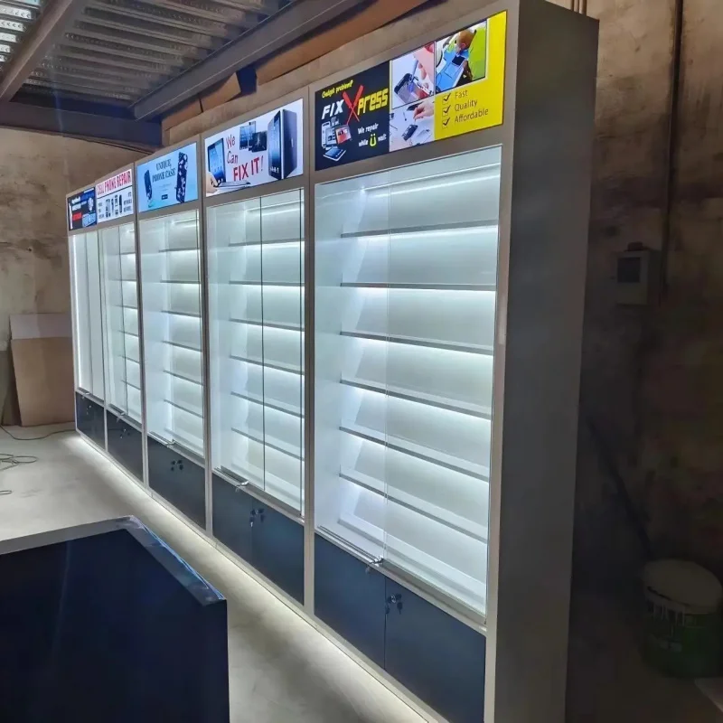 custom.Custom Cellphone Repair Shop Decoration Modern Mobile Phone Display Shelves LED Lighting Slat Wall Display High Quality - view 6