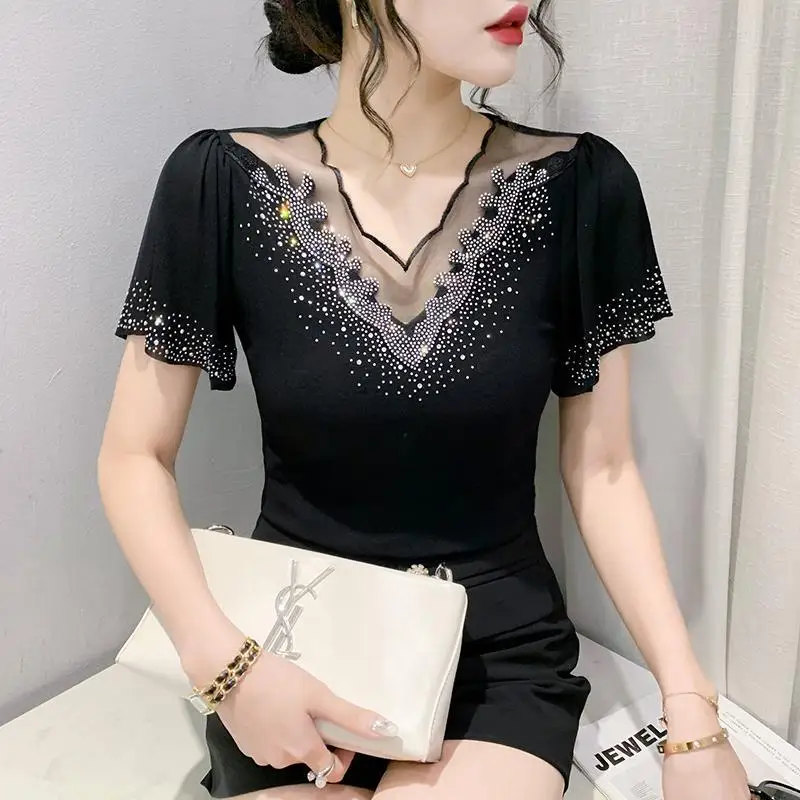 2025 夏の新中空ファッションダイヤモンド半袖 Tシャツ女性のためのスリム蓮の葉スリーブプルオーバー