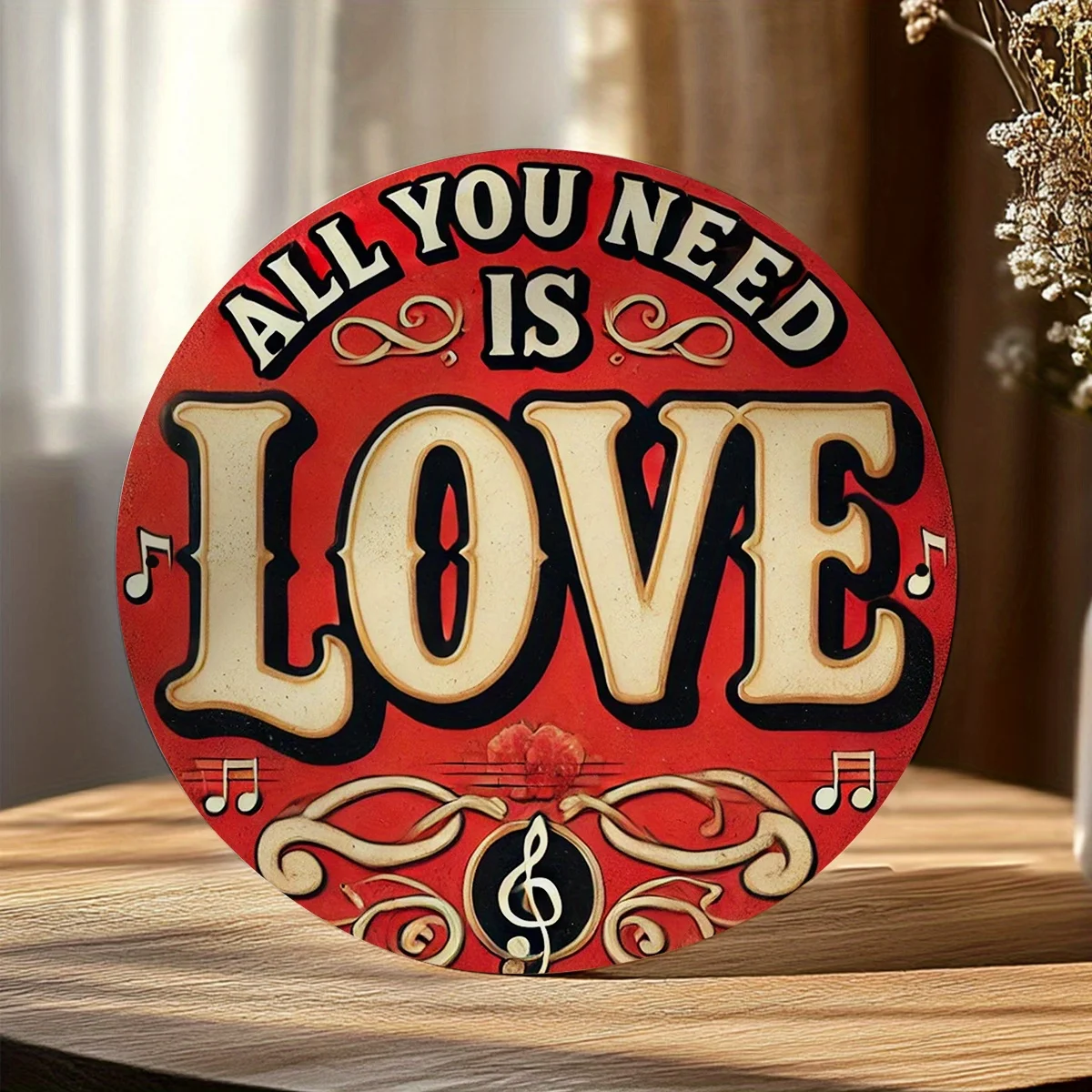 Featuring a Design That Says 'All You Need Is Love', It Has a Festive Red And White Color Scheme with Musical Notes And Swirls