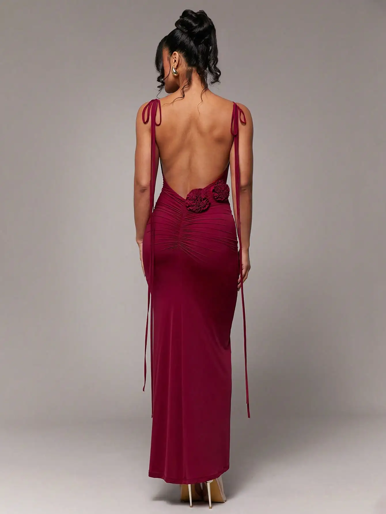 

Burgundy Backless Halter Mermaid Gown with Ruched Waist and Floral Appliqués