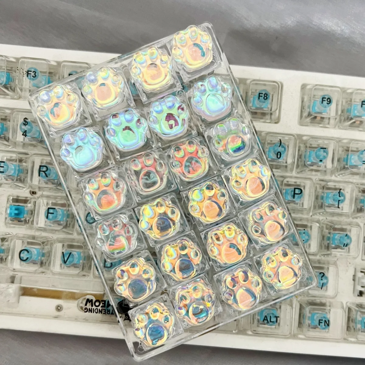 

Personalized resin Epoxy laser cat claw keycap light-transmitting cute cross axis mechanical keyboard keycap single