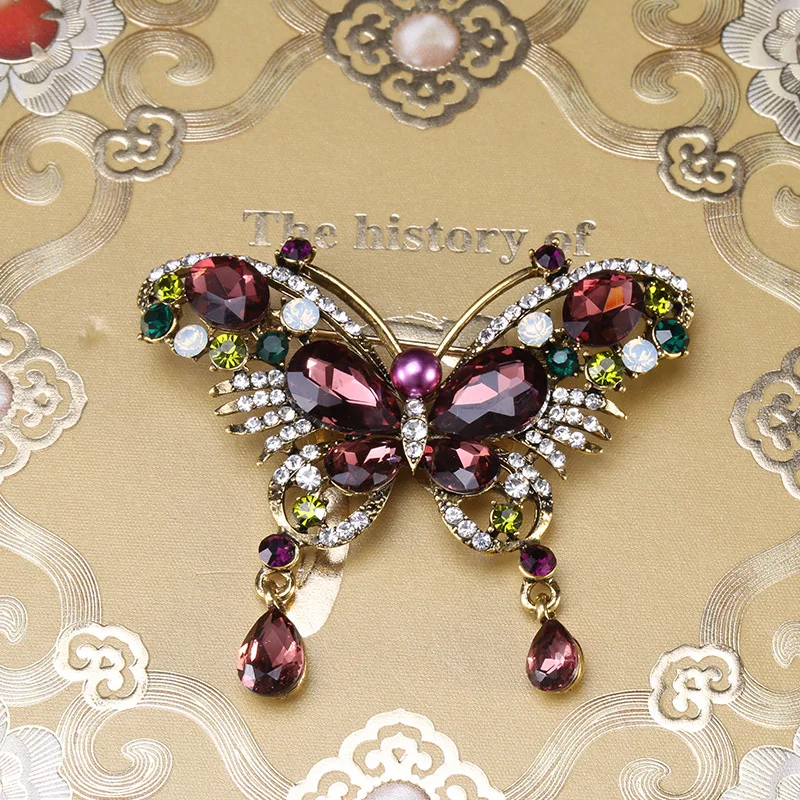 

Stylish Butterfly Brooch Pin with Blue Rhinestone Wings, Perfect for Dressing Up and Casual Wear