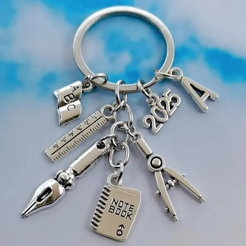 موضة جديدة A-Z رسالة القلم سحر البوصلة حاكم دفتر المعلم المفاتيح مدرسة المعلم هدية مجوهرات