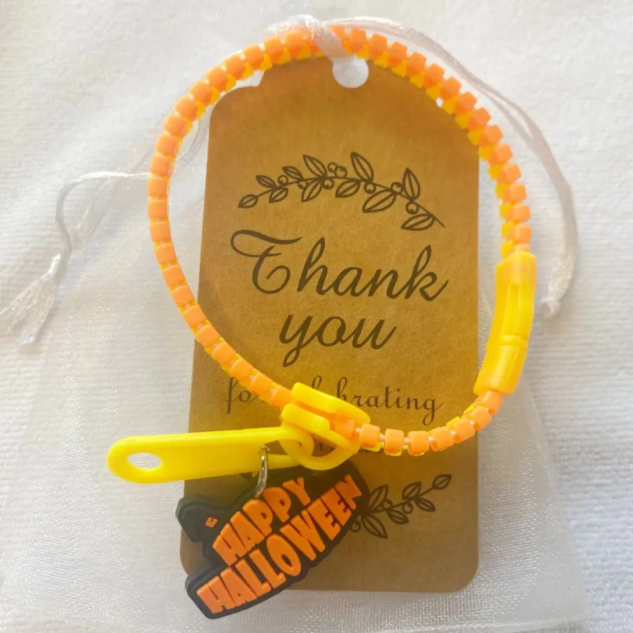 10Sets Halloween Party Favors Zipper Wristbands Bulk Trick Treat Gifts Prizes Giveaways with Organza Bags Thank You Kraft Tags