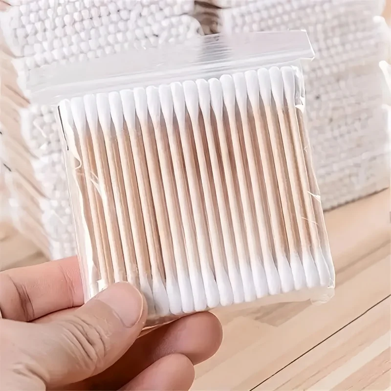 عصي مساحيق تجميل قطنية مزدوجة الأطراف ، قضبان خشبية ، تستخدم لتنظيف الأذنين وإزالة المكياج