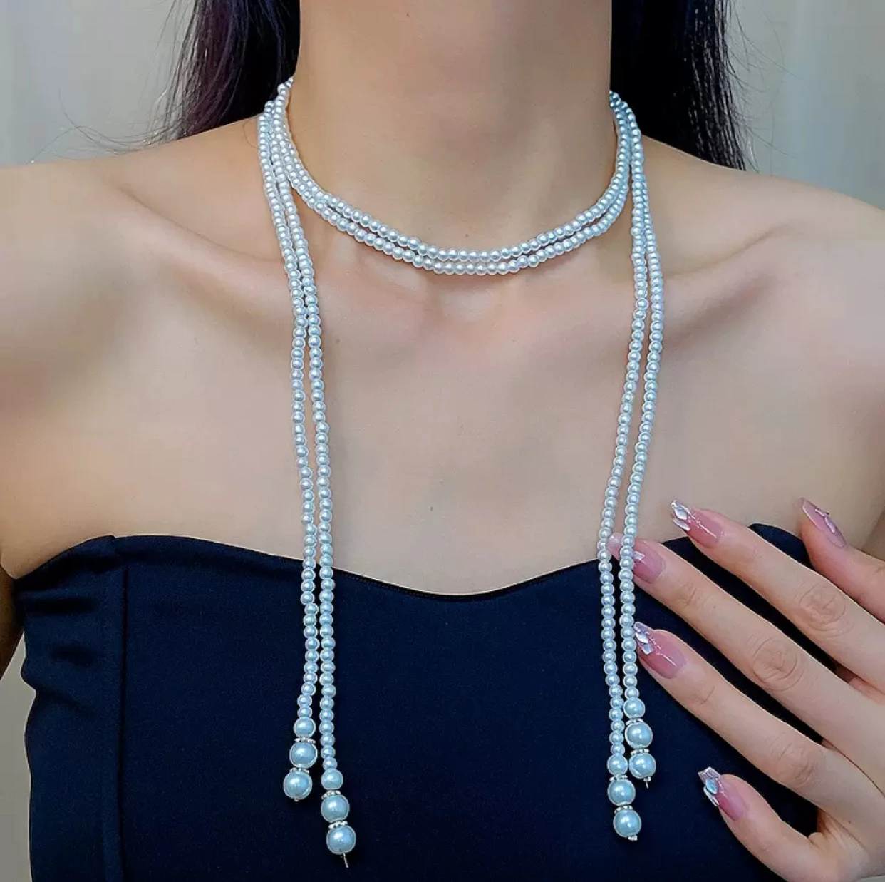 Collana di perle dal design di lusso da donna, stile lungo, sensazione di fascia alta, catena per colletto alla moda, catena cardigan di perle, semplice