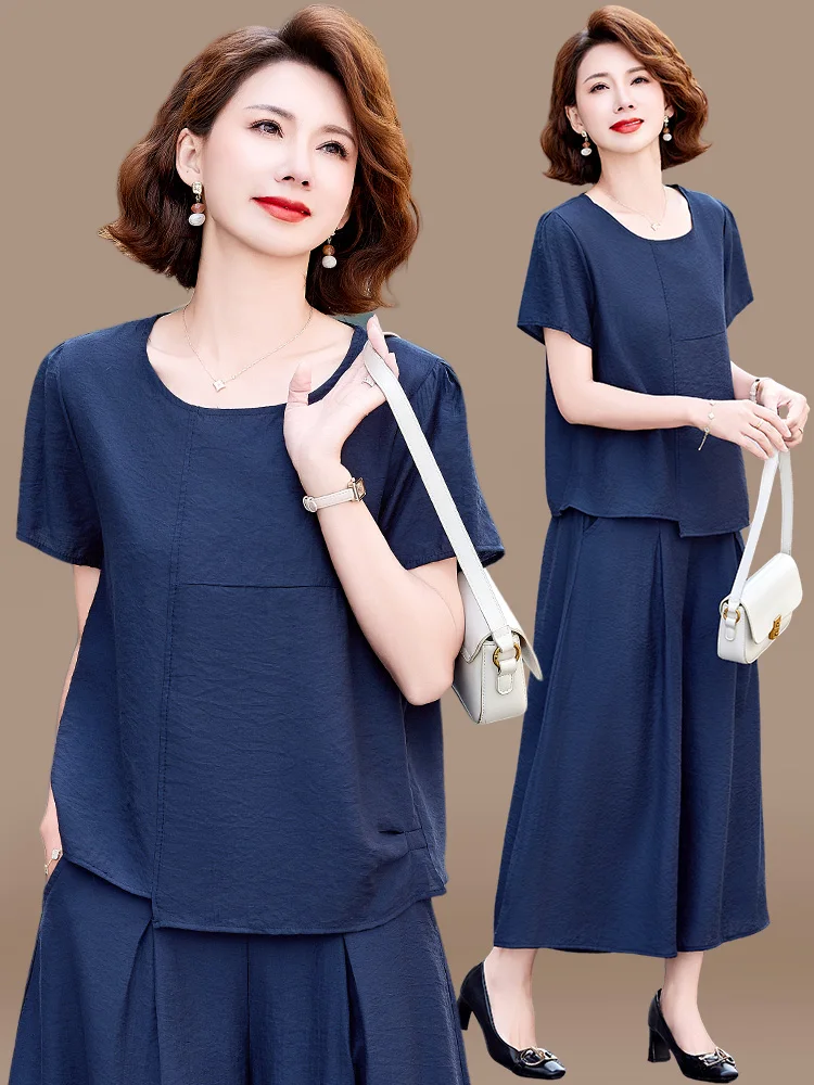 

Повседневный летний комплект из хлопка и льна для мам среднего возраста: топ с коротким рукавом и брюки/юбка, модный комплект из двух предметов.