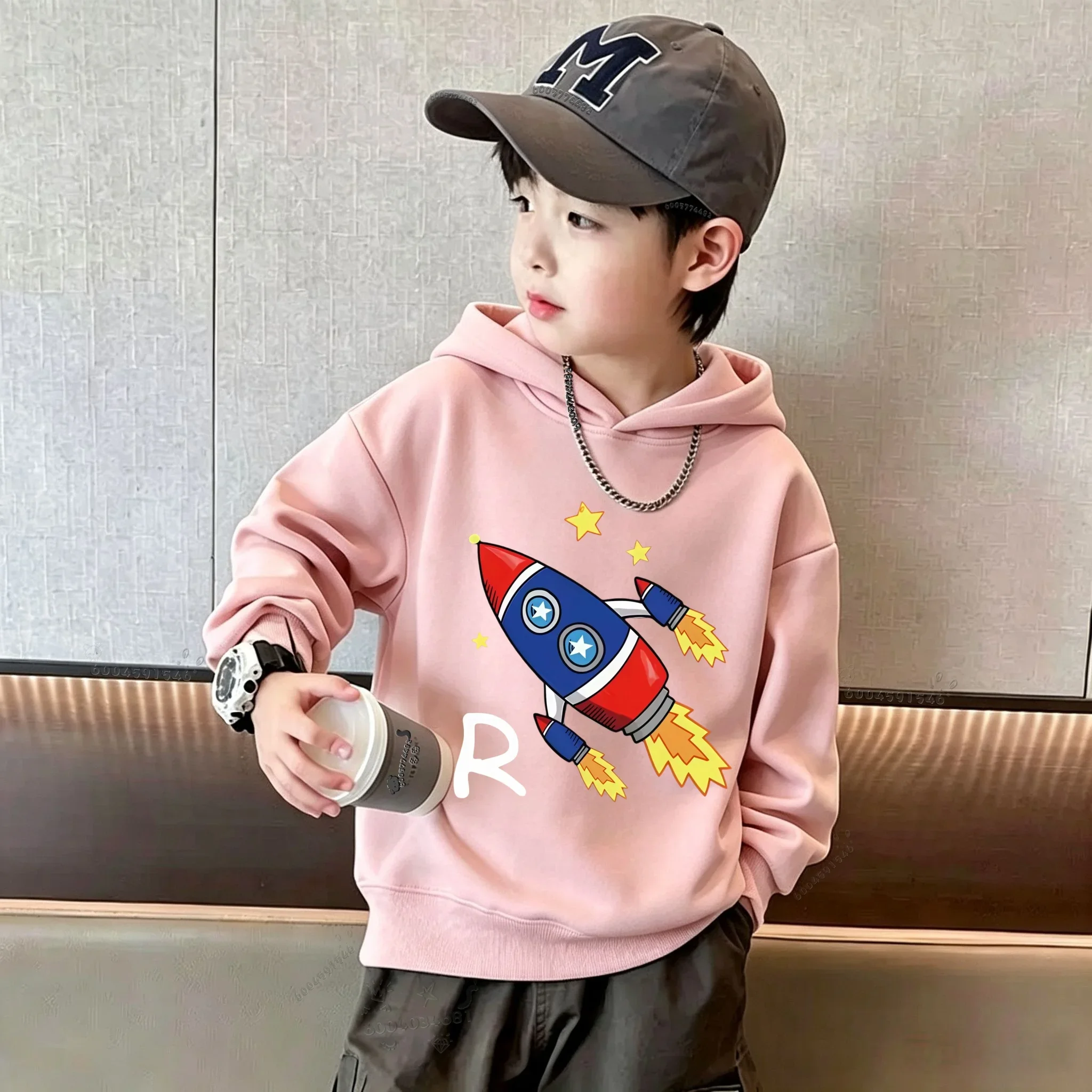 Unisex hoodie for boys and girls, featuring a rocket and star pattern;a loose thick and cozy hooded style for autumn and winter.
