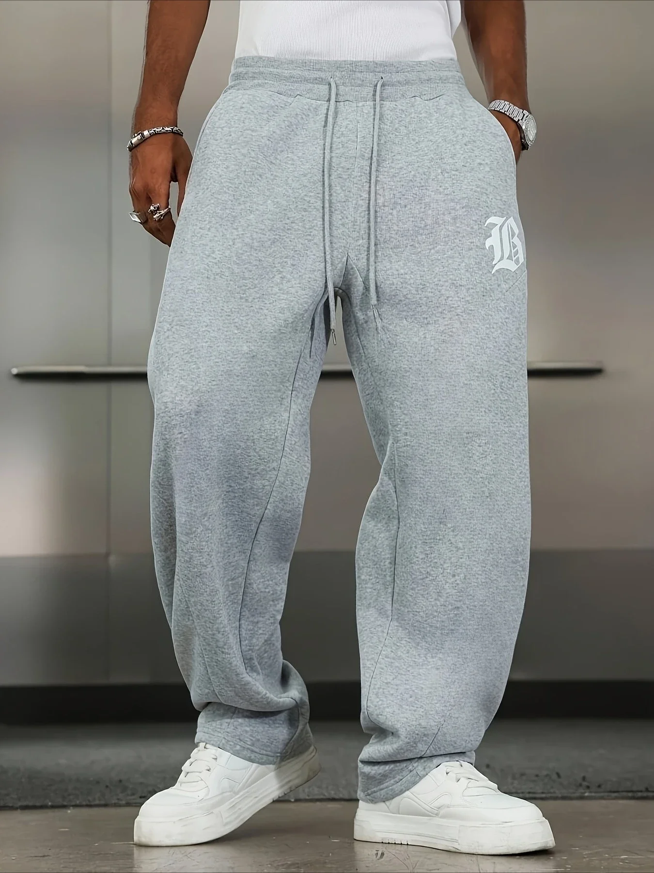 Men's casual pants, classic solid-colored trousers, loose fit, with pocket print pattern, drawstring waistband design