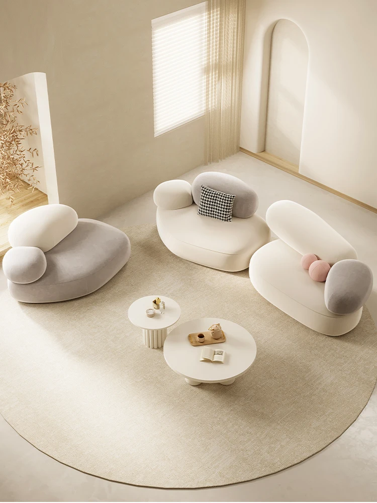 Creative cream style living room fabric sofa, small apartment special-shaped simple goose soft stone