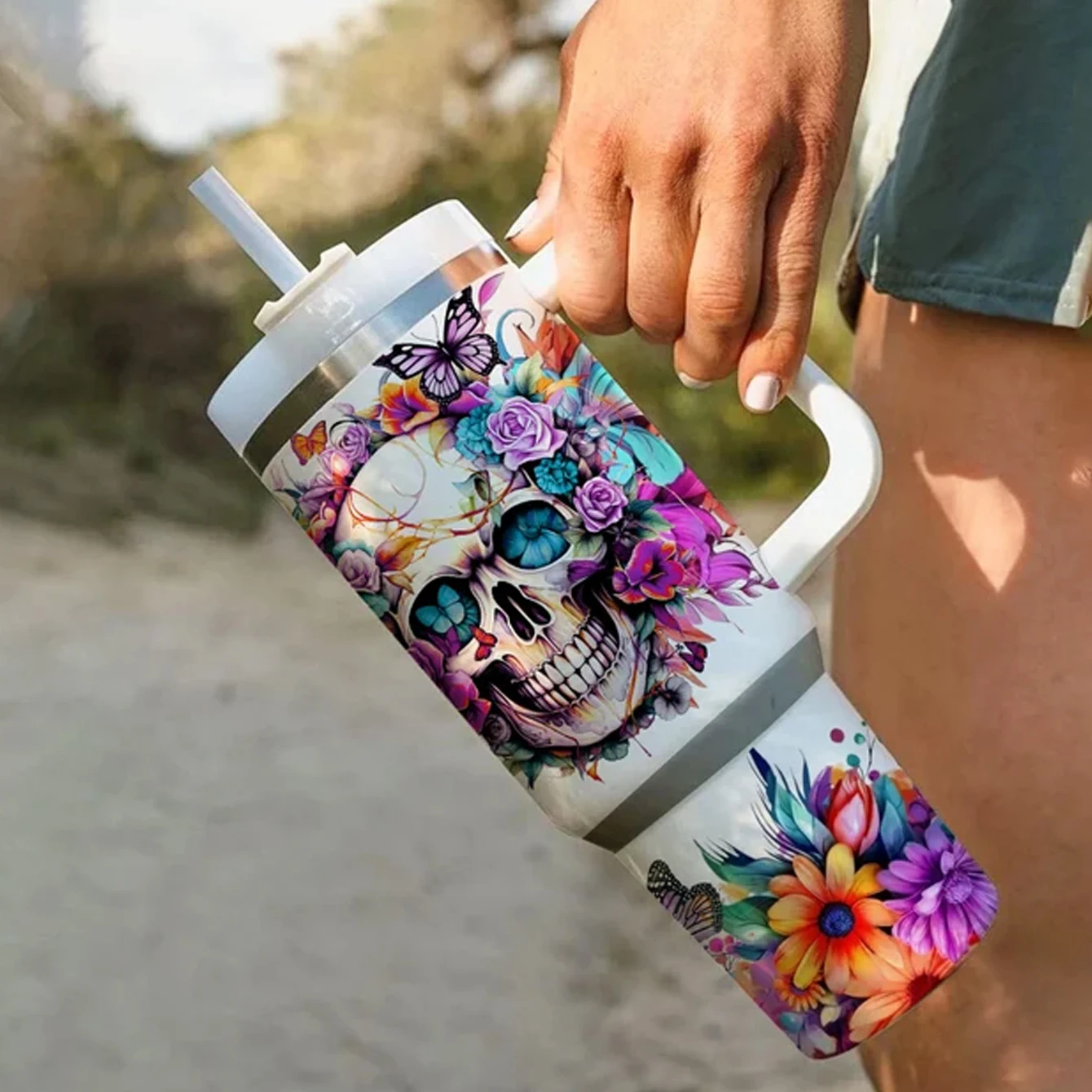 2 pieces of trendy skull floral UV DTF stickers. Eye-catching colors for standout photos. Securely adhere to thermoses and mugs